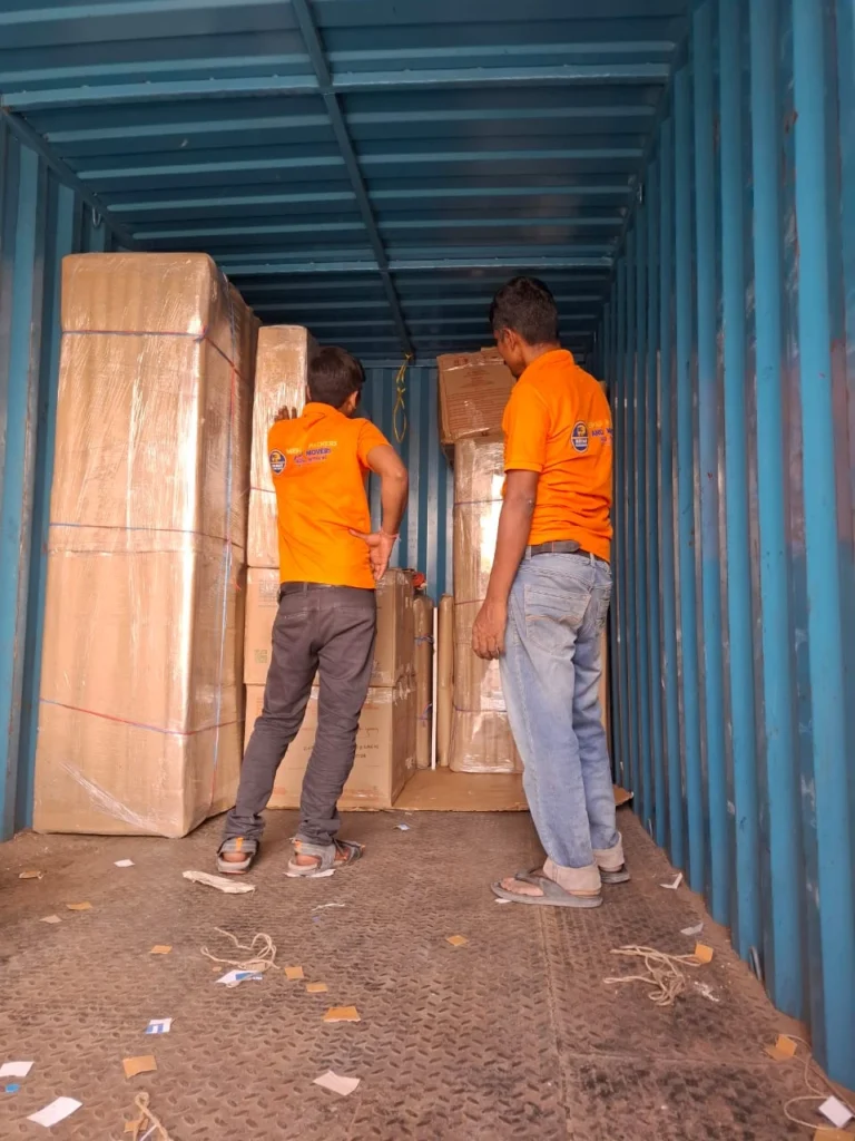 Mehar Packers and Movers team loading household items in a moving truck in Patna.