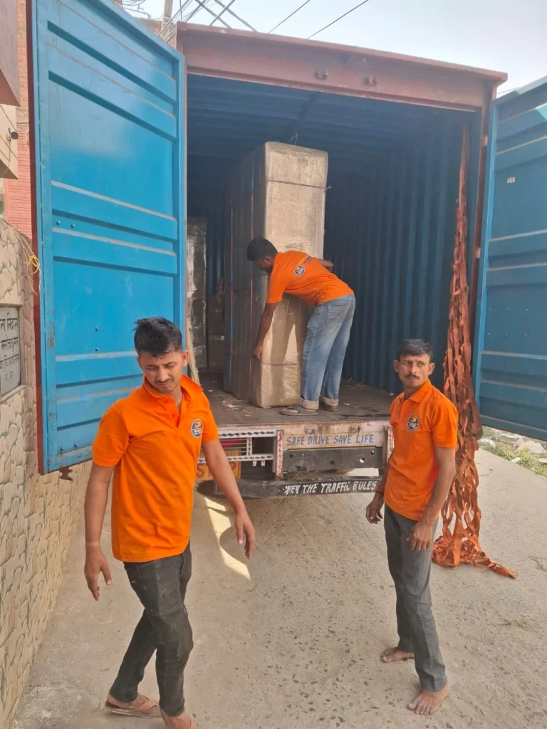 Mehar Packers and Movers team unloading cargo from a truck in Patna, showcasing IBA approved packers and movers services.
